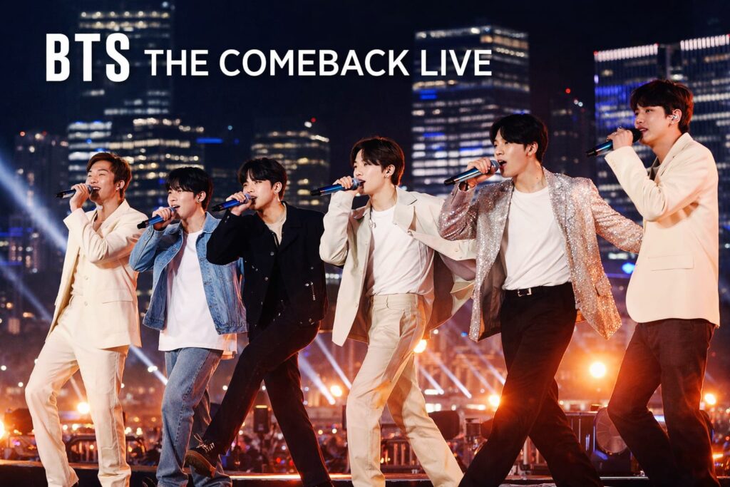 BTS The Comeback Live OTT Releases concert on Netflix 2026 with live stage performance and city lights background
