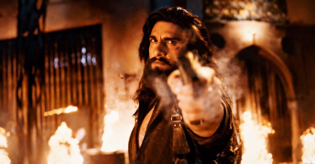  Dhurandhar 2 Box Office Collection Day 6 Ranveer Singh pointing gun action scene high intensity