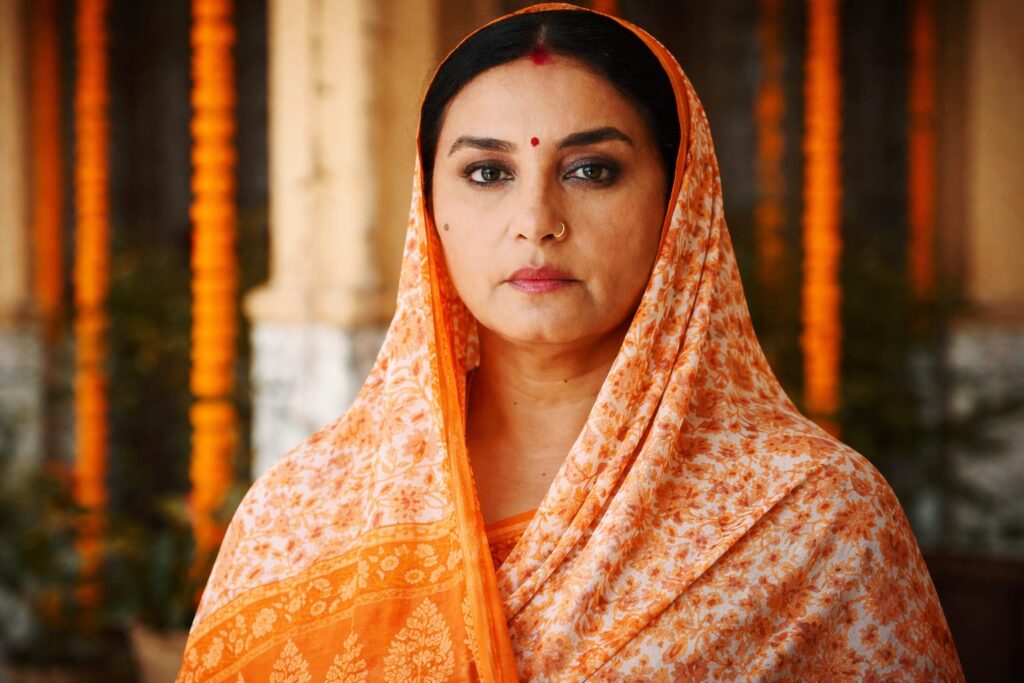 Divya Dutta serious expression orange dupatta emotional scene Bollywood actress closeup
